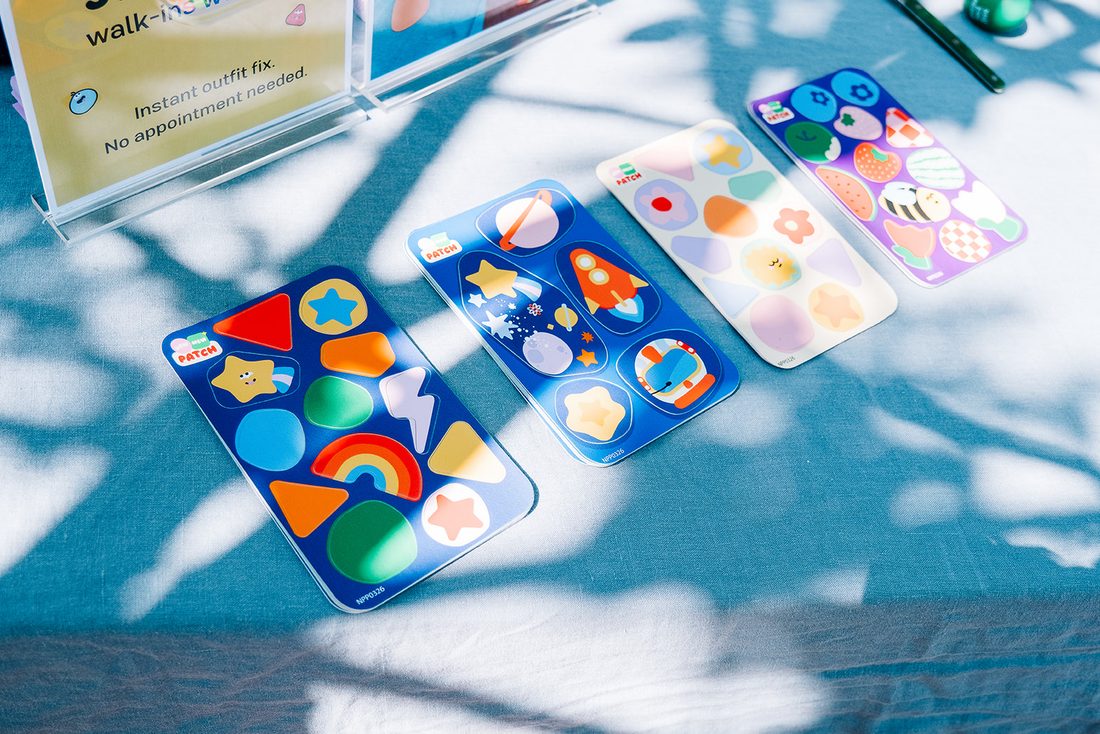 Sheets of colourful Sticker Patches laid out